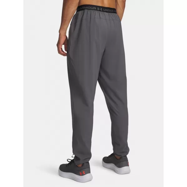  Pánské sportovní kalhoty UNDER ARMOUR VANISH TRAINING PANT 6010606-025 ŠEDÁ 