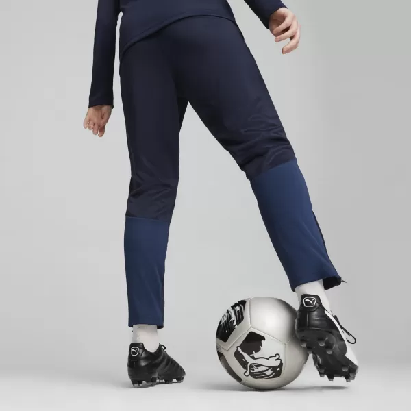  Dámské tepláky PUMA TEAMGOAL TRAINING PANT WMN 658642-06 PUMA NAVY/WHITE/PERSIAN BLUE 