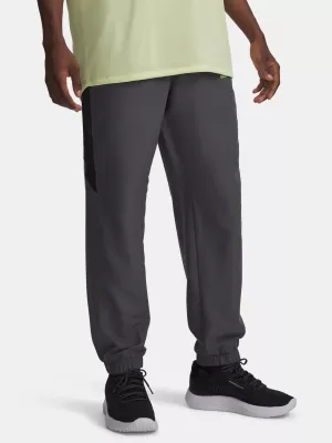 Pánské sportovní kalhoty UNDER ARMOUR TECH SPORT PANT 6011268-025 ŠEDÁ