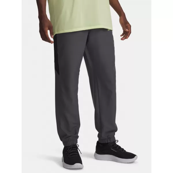  Pánské sportovní kalhoty UNDER ARMOUR TECH SPORT PANT 6011268-025 ŠEDÁ 