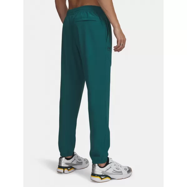  Pánské tepláky UNDER ARMOUR VIBE WOVEN JOGGER 1386557-338 ZELENÁ 