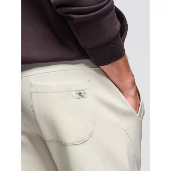  Pánské tepláky OMBRE OM-PABS-0305 CREAM 