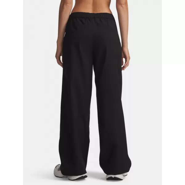  Dámské sportovní kalhoty UNDER ARMOUR UNSTOPPABLE WVN PANT 6014752-008 ČERNÁ 