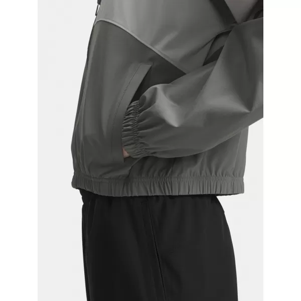  Dámská bunda UNDER ARMOUR RIVAL WOVEN JACKET 1389631-709 WHITE 
