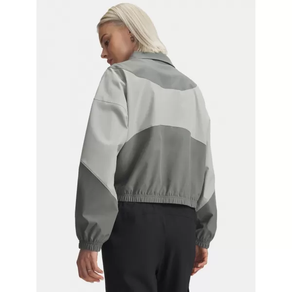  Dámská bunda UNDER ARMOUR RIVAL WOVEN JACKET 1389631-709 WHITE 