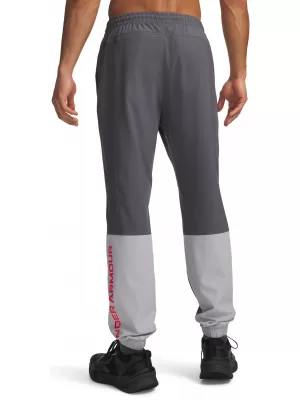 Pánské sportovní kalhoty UNDER ARMOUR UA TECH UTILITY WOVEN PANT 6013802-025 ŠEDÁ