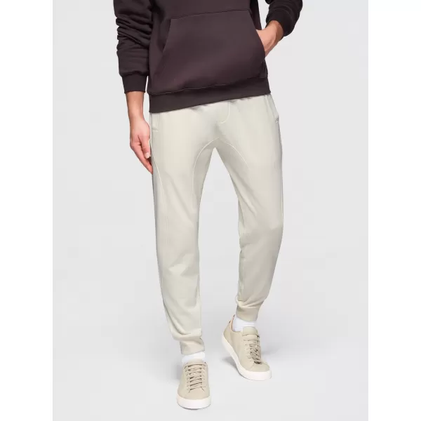  Pánské tepláky OMBRE OM-PABS-0305 CREAM 