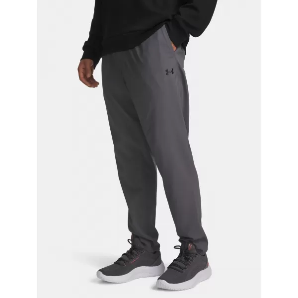  Pánské sportovní kalhoty UNDER ARMOUR VANISH TRAINING PANT 6010606-025 ŠEDÁ 