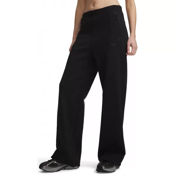  Dámské tepláky UNDER ARMOUR UNSTOPPABLE FLC OPEN PANT 6013522-008 ČERNÁ 