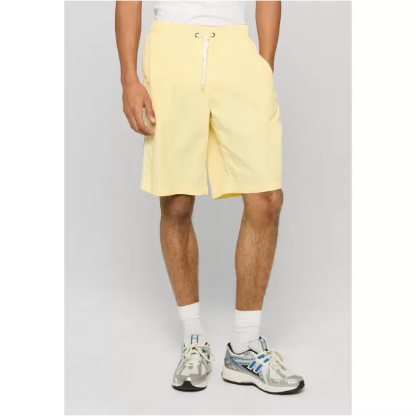 Pánské koupací šortky URBAN CLASSICS TB7397-21553 PALE YELLOW 
