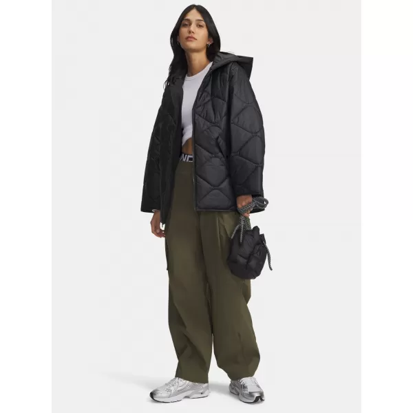  Dámské kalhoty UNDER ARMOUR UA UNSTOPPABLE RSTOP CARGO 6007025-390 ZELENÁ 