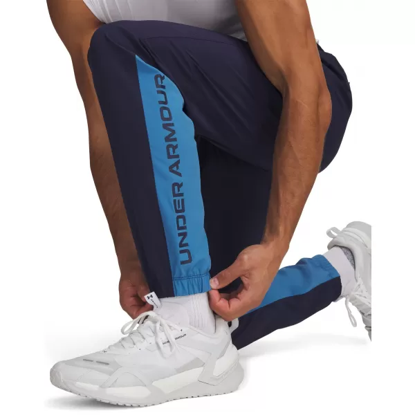  Pánské sportovní kalhoty UNDER ARMOUR UA TECH UTILITY WOVEN PANT 6013802-410 MODRÁ 
