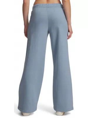Dámské tepláky UNDER ARMOUR ICON FLC SAMA WIDE LEG 6017108-448 MODRÁ