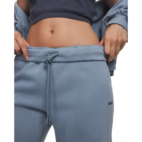  Dámské tepláky UNDER ARMOUR ICON FLC SAMA WIDE LEG 6017108-448 MODRÁ 