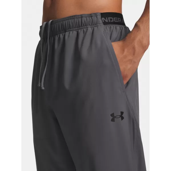  Pánské sportovní kalhoty UNDER ARMOUR VANISH TRAINING PANT 6010606-025 ŠEDÁ 