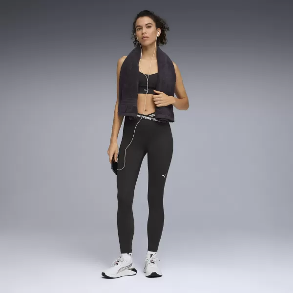  Dámské legíny PUMA W STRONG CROSS FRONT TIGHT - HW 7/8 52849801 PUMA BLACK 