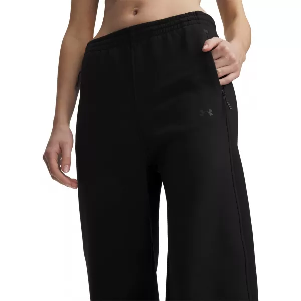  Dámské tepláky UNDER ARMOUR UNSTOPPABLE FLC OPEN PANT 6013522-008 ČERNÁ 