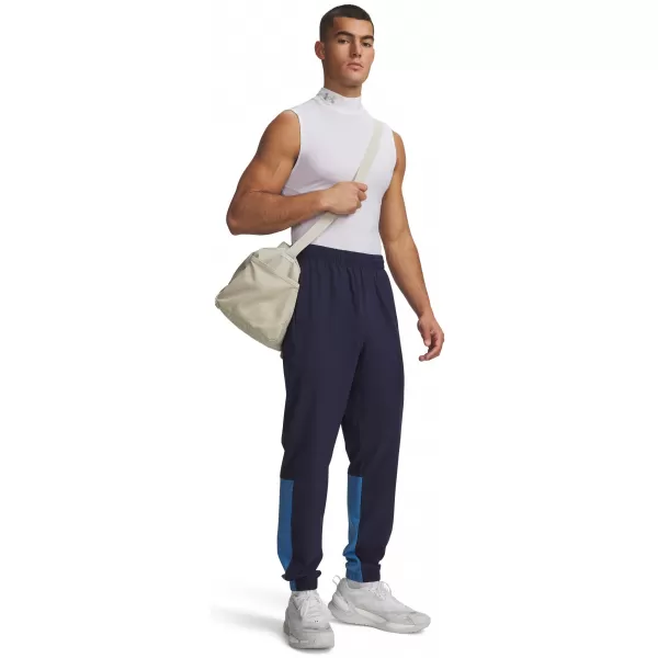  Pánské sportovní kalhoty UNDER ARMOUR UA TECH UTILITY WOVEN PANT 6013802-410 MODRÁ 