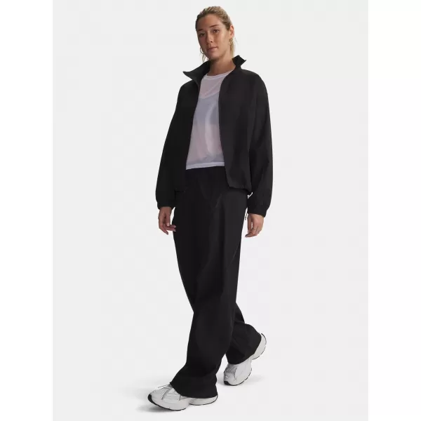  Dámské sportovní kalhoty UNDER ARMOUR UNSTOPPABLE WVN PANT 6014752-008 ČERNÁ 