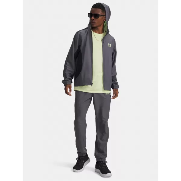 Pánské sportovní kalhoty UNDER ARMOUR TECH SPORT PANT 6011268-025 ŠEDÁ 