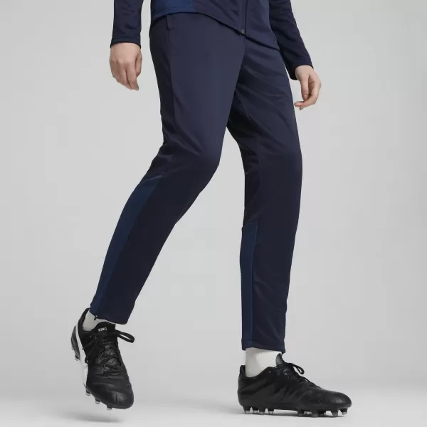  Dámské tepláky PUMA TEAMGOAL TRAINING PANT WMN 658642-06 PUMA NAVY/WHITE/PERSIAN BLUE 