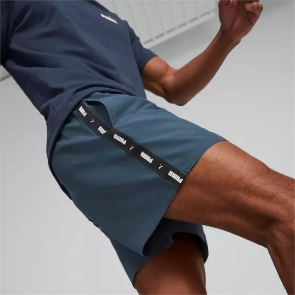  Pánské šortky PUMA ESS+ TAPE WOVEN SHORTS 849043-16 BLUE 