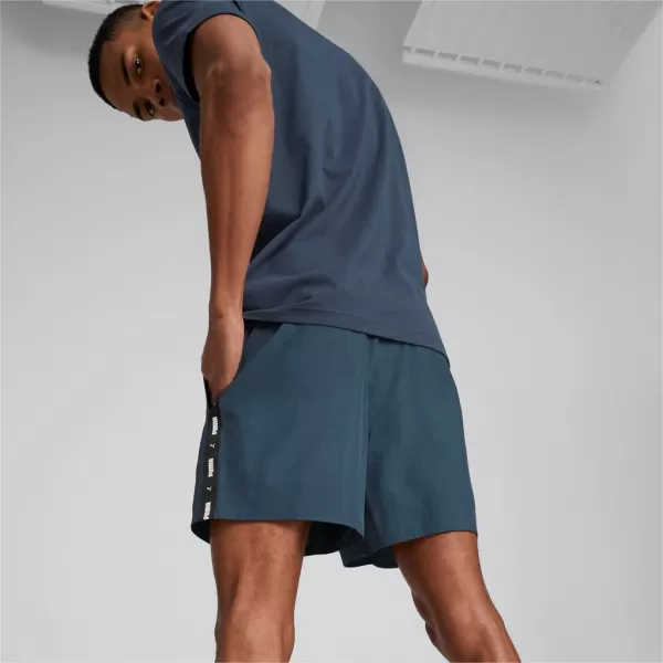  Pánské šortky PUMA ESS+ TAPE WOVEN SHORTS 849043-16 BLUE 