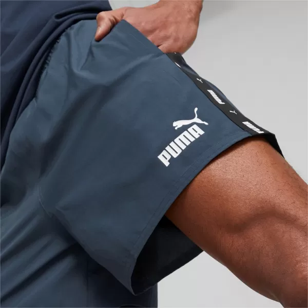  Pánské šortky PUMA ESS+ TAPE WOVEN SHORTS 849043-16 BLUE 
