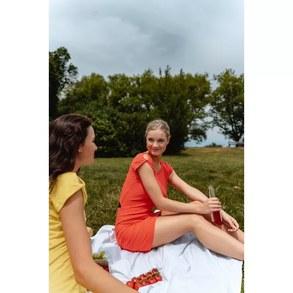  Dámské šaty NORDBLANC WAISTLINE NBSLD7805 ORANŽOVÝ INKOUST 