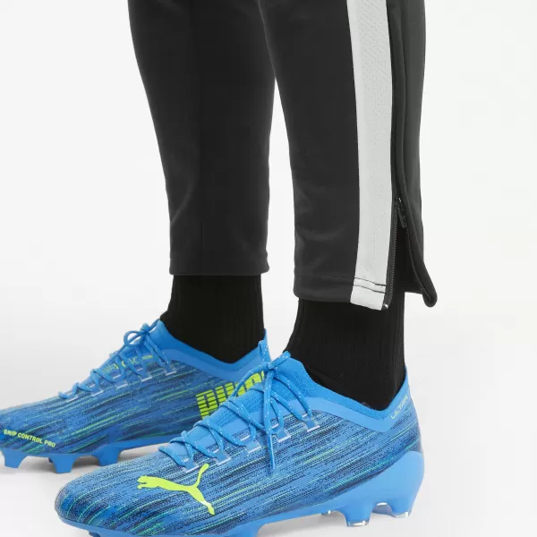  Pánské kalhoty PUMA TEAMLIGA TRAINING PANTS 657242_03 PUMA BLACK/PUMA WHITE 