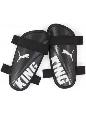 Chrániče PUMA KING STRAP 030935_01 PUMA BLACK/PUMA WHITE