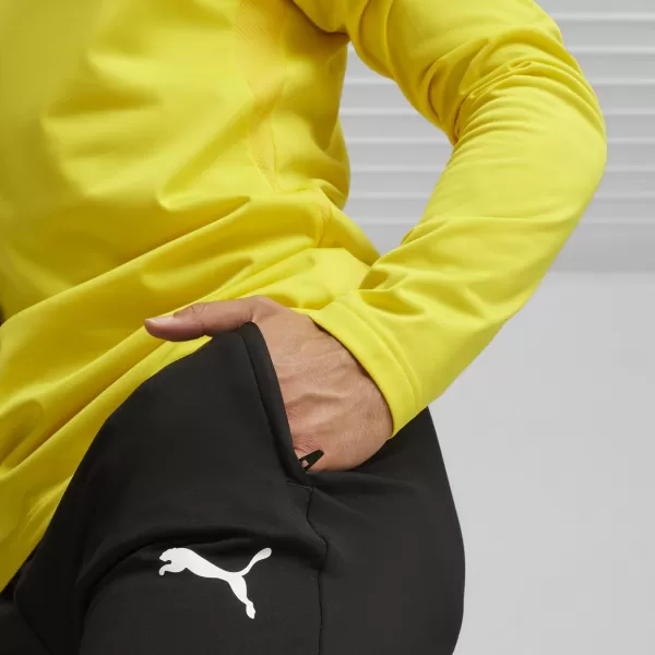  Pánské kalhoty PUMA TEAMGOAL SLIM TRAINING PANTS 659037_03 PUMA BLACK/PUMA WHITE 