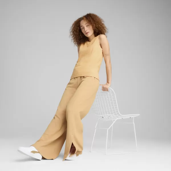  Dámské tílko PUMA HER TANK TOP 685064_41 ALMOST APRICOT 