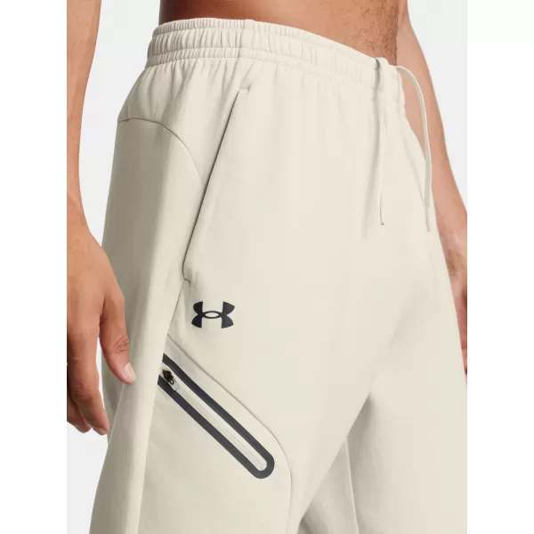  Pánské tepláky UNDER ARMOUR UNSTOPPABLE FLC JGR EU 1389353-110 BÍLÁ 