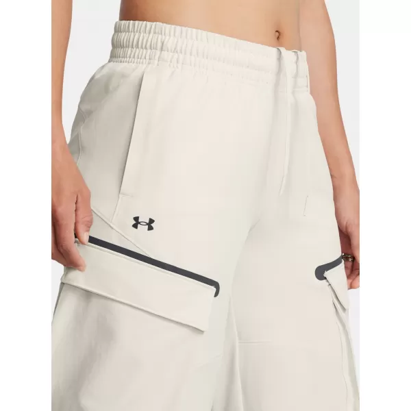  Dámské sportovní kalhoty UNDER ARMOUR UNSTOPPABLE CARGO PANT 1386481-110 BÍLÁ 
