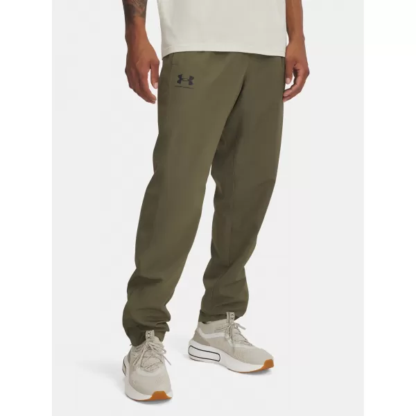  Pánské sportovní kalhoty UNDER ARMOUR RIVAL WVN WINDBREAKER PN 1390150-390 ZELENÁ 