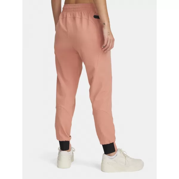  Dámské tepláky UNDER ARMOUR UNSTOPPABLE JOGGER 1376926-698 RŮŽOVÁ 