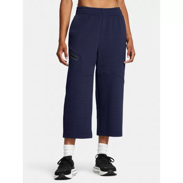  Dámské sportovní kalhoty UNDER ARMOUR UNSTOPPABLE FLC GRID CROP 1386492-410 MODRÁ 