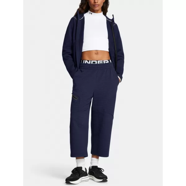  Dámské sportovní kalhoty UNDER ARMOUR UNSTOPPABLE FLC GRID CROP 1386492-410 MODRÁ 