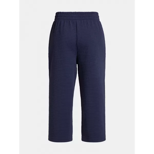  Dámské sportovní kalhoty UNDER ARMOUR UNSTOPPABLE FLC GRID CROP 1386492-410 MODRÁ 