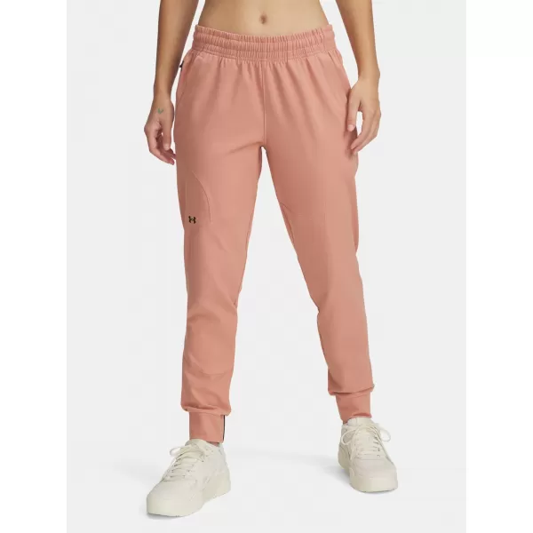  Dámské tepláky UNDER ARMOUR UNSTOPPABLE JOGGER 1376926-698 RŮŽOVÁ 