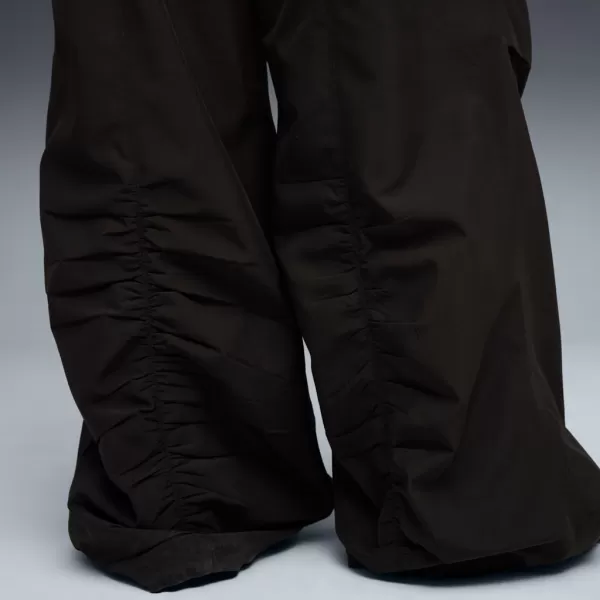  Dámské kalhoty PUMA WARDROBE ESS PARACHUTE WOVEN PANTS OP 632044-01 ČERNÁ 