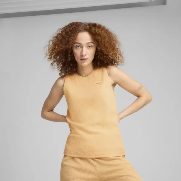  Dámské tílko PUMA HER TANK TOP 685064_41 ALMOST APRICOT 