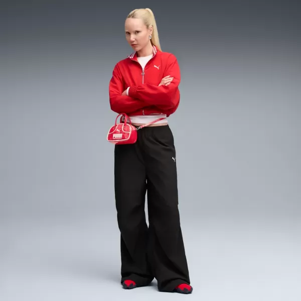  Dámské kalhoty PUMA WARDROBE ESS PARACHUTE WOVEN PANTS OP 632044-01 ČERNÁ 