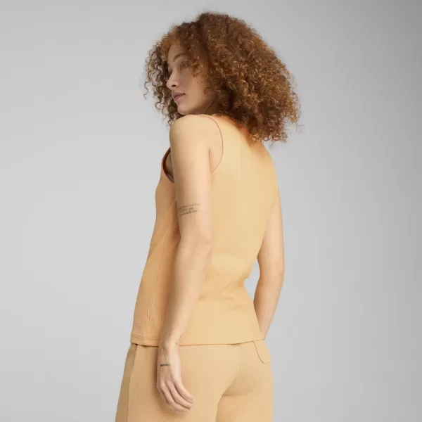  Dámské tílko PUMA HER TANK TOP 685064_41 ALMOST APRICOT 