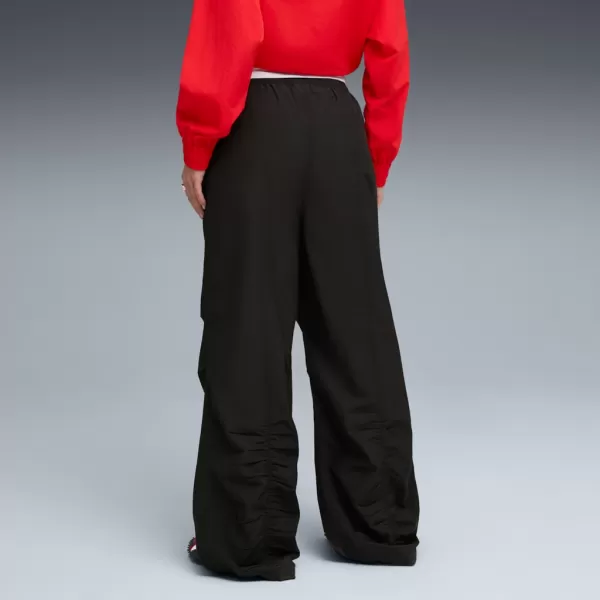  Dámské kalhoty PUMA WARDROBE ESS PARACHUTE WOVEN PANTS OP 632044-01 ČERNÁ 
